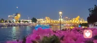 华灯初上，漫步海河。
宇纳美景，凡守初心。
晚风濯念，静水安魂。
星河垂岸，大道归心。
人间向暖，不负本真。配图