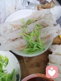 子长煎饼的吃法。配图