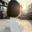 L.